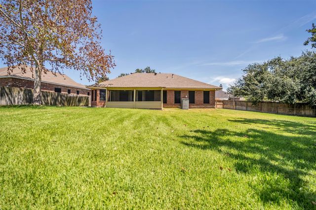 7093 Whispering Wind Drive, Willis, TX 77318
