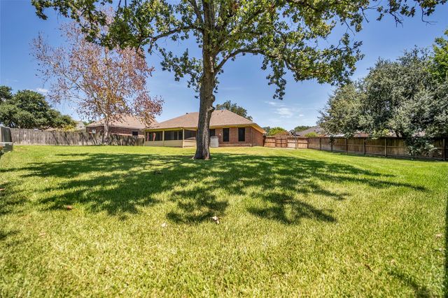 7093 Whispering Wind Drive, Willis, TX 77318