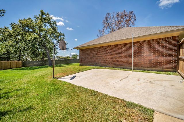 7093 Whispering Wind Drive, Willis, TX 77318