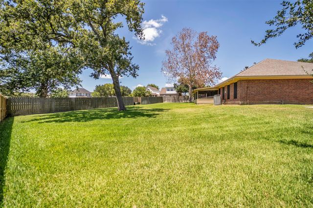 7093 Whispering Wind Drive, Willis, TX 77318