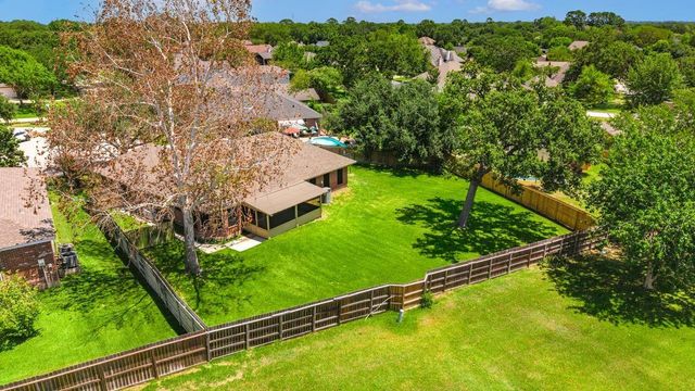 7093 Whispering Wind Drive, Willis, TX 77318