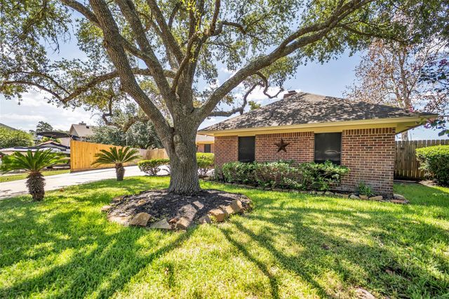 7093 Whispering Wind Drive, Willis, TX 77318