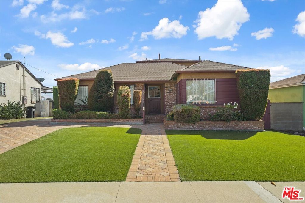 Image 1 of property listing at 2124 W 112th St, Los Angeles, CA 90047