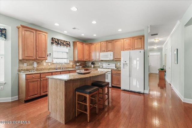 9 Silver Charm Road, Manalapan, NJ 07726