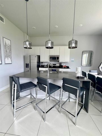 7770 SANDY RIDGE DRIVE 207, Reunion, FL 34747