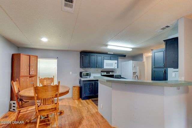 1040 Green Acres Circle S, South Daytona, FL 32119