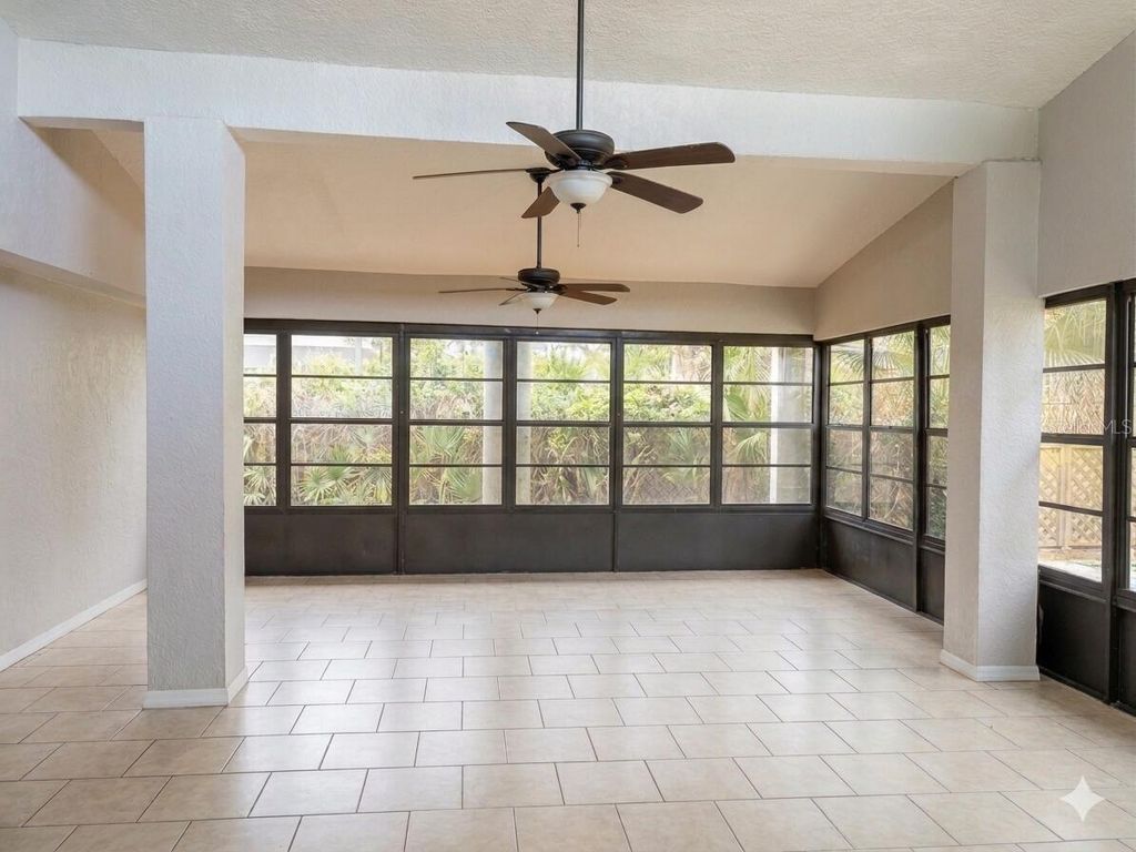 Image 4 of property listing at 8618 GRANDVIEW DRIVE, Tampa, FL 33617