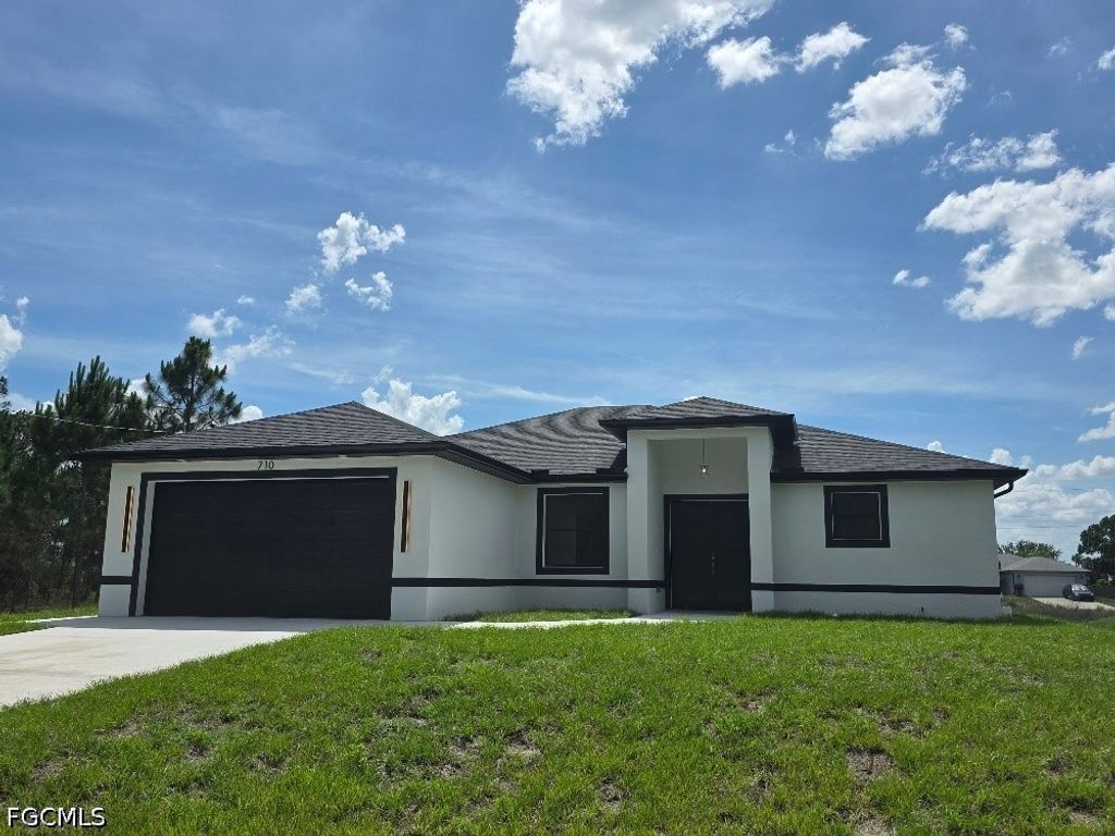 710 Godwid AVE S, Lehigh Acres, FL 33974