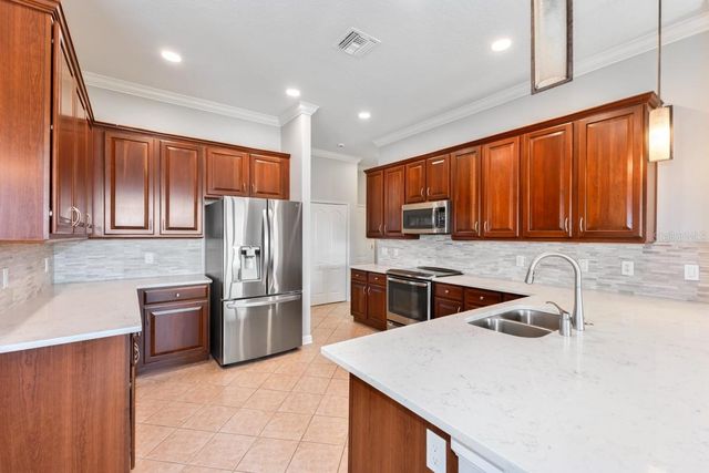 7704 KINGS PASSAGE AVENUE, Orlando, FL 32835