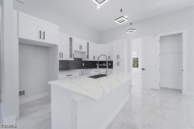 1504 E 6th ST, Lehigh Acres, FL 33972