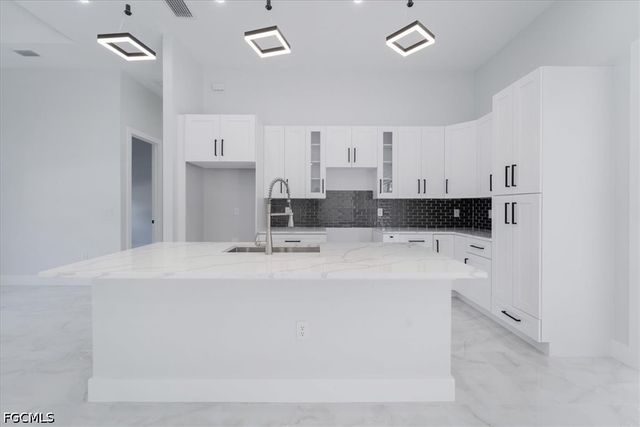 1504 E 6th ST, Lehigh Acres, FL 33972