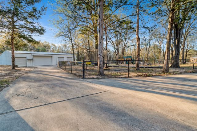 390 Timber Lakes Drive, Powderly, TX 75473