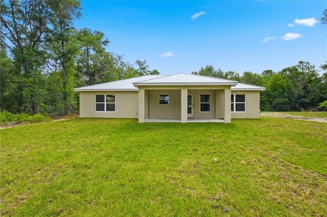 124 GUAVA TERRACE, Ocklawaha, FL 32179