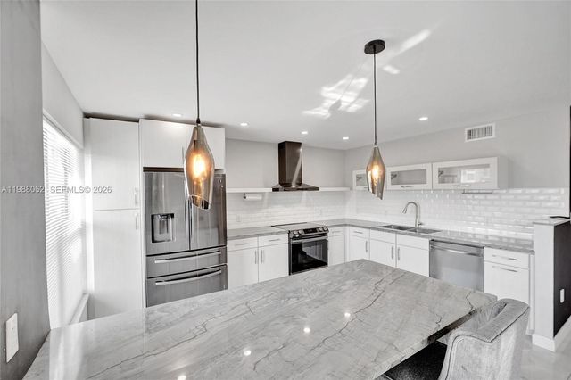 1075 92nd St 405, Bay Harbor Islands, FL 33154