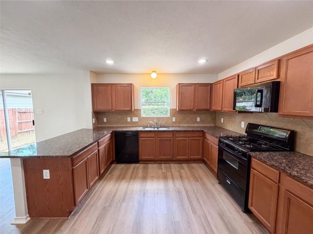 939 Staffordale Manor Lane, Houston, TX 77047