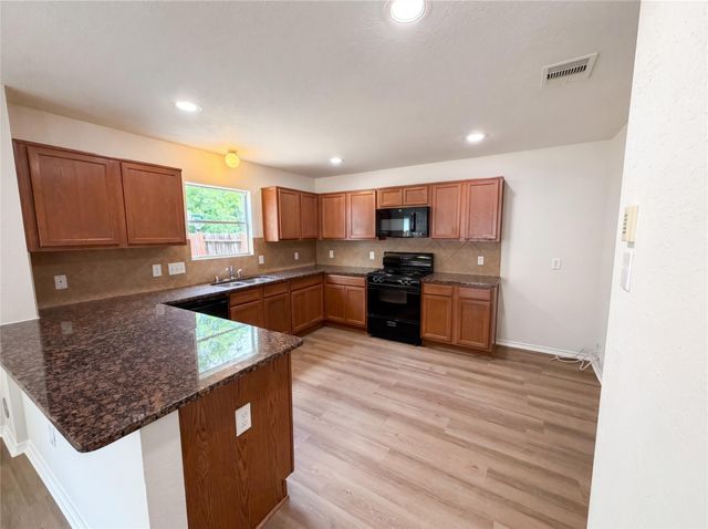 939 Staffordale Manor Lane, Houston, TX 77047