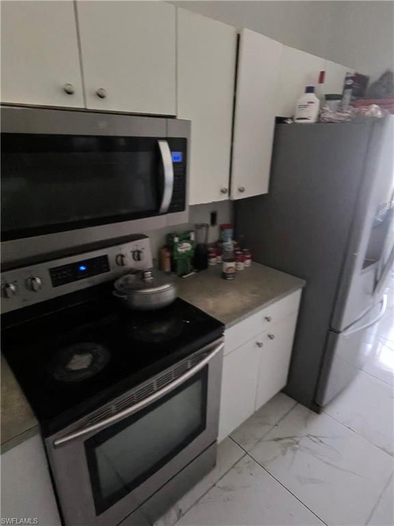 2724 6th ST SW, LEHIGH ACRES, FL 33976 — photo 2