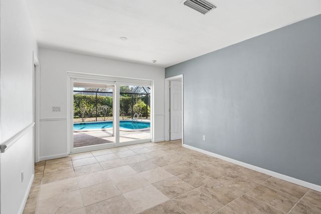 9696 Honeysuckle Avenue, Palm Beach Gardens, FL 33410