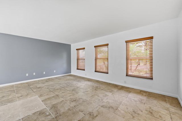 9696 Honeysuckle Avenue, Palm Beach Gardens, FL 33410