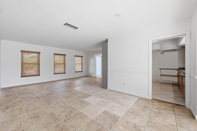 9696 Honeysuckle Avenue, Palm Beach Gardens, FL 33410