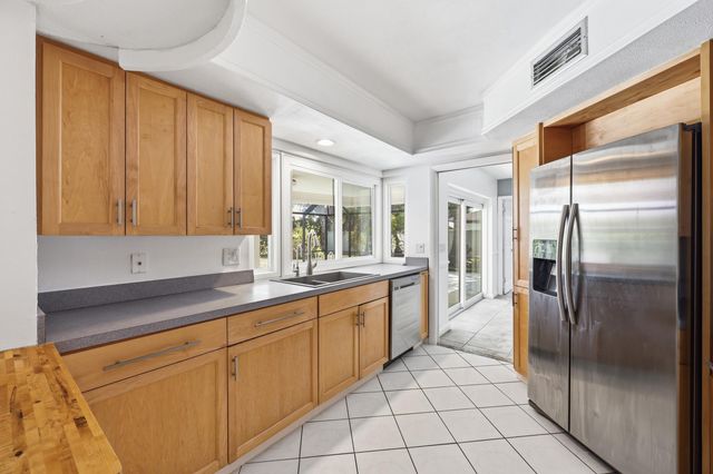 9696 Honeysuckle Avenue, Palm Beach Gardens, FL 33410