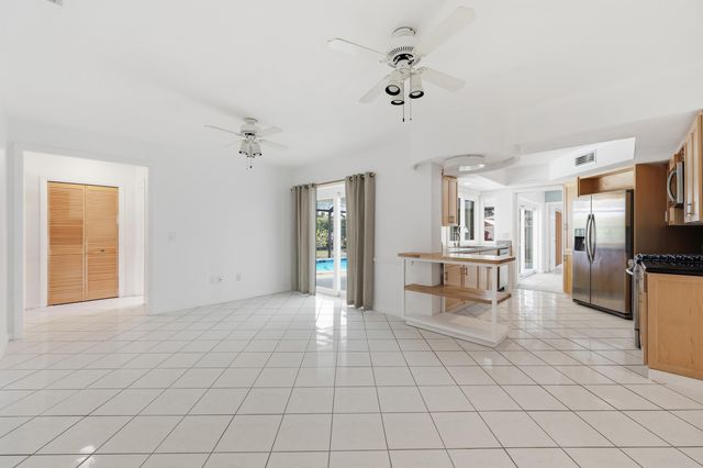 9696 Honeysuckle Avenue, Palm Beach Gardens, FL 33410