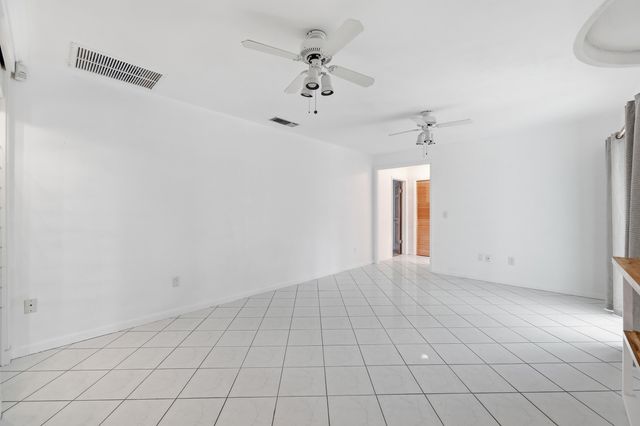 9696 Honeysuckle Avenue, Palm Beach Gardens, FL 33410