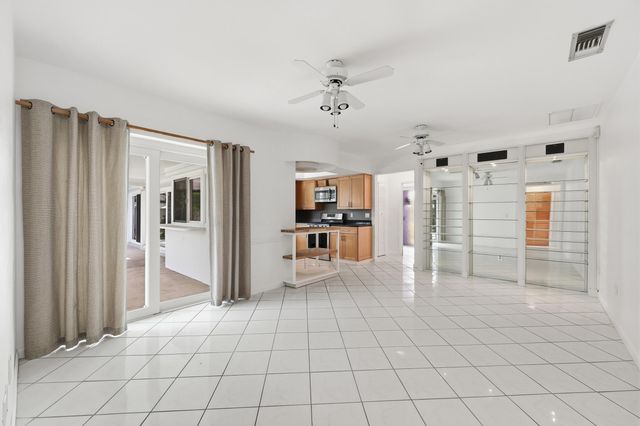 9696 Honeysuckle Avenue, Palm Beach Gardens, FL 33410