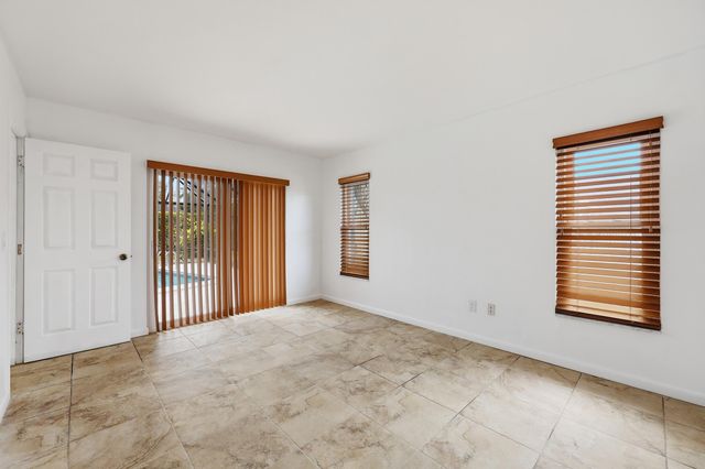 9696 Honeysuckle Avenue, Palm Beach Gardens, FL 33410