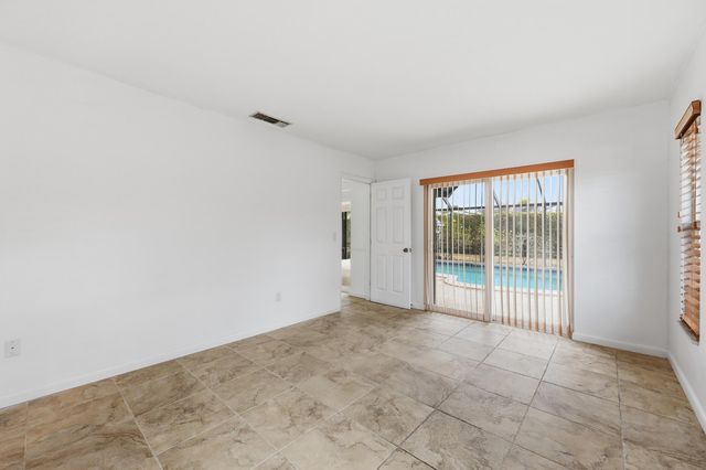 9696 Honeysuckle Avenue, Palm Beach Gardens, FL 33410