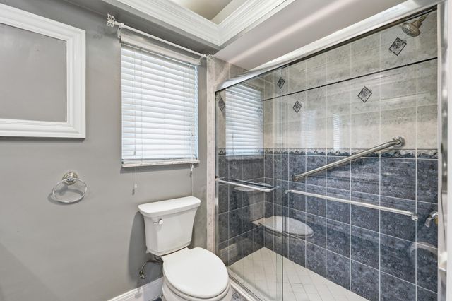 9696 Honeysuckle Avenue, Palm Beach Gardens, FL 33410