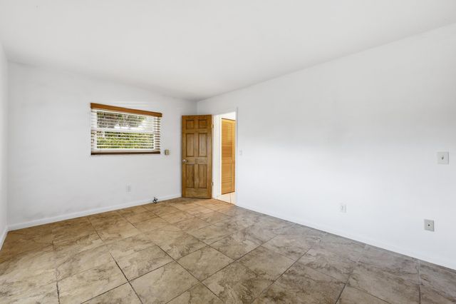 9696 Honeysuckle Avenue, Palm Beach Gardens, FL 33410