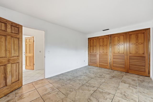 9696 Honeysuckle Avenue, Palm Beach Gardens, FL 33410