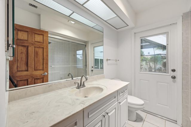 9696 Honeysuckle Avenue, Palm Beach Gardens, FL 33410