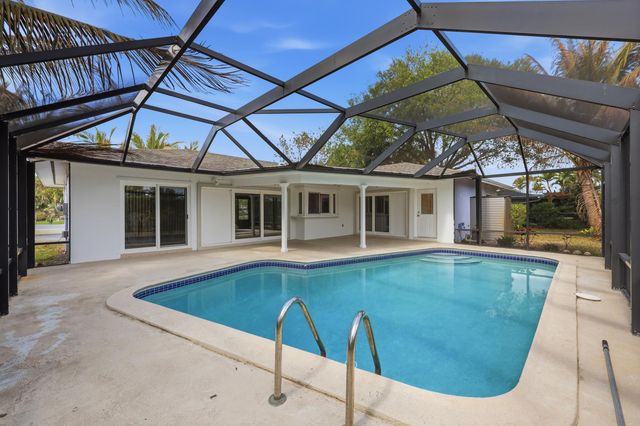 9696 Honeysuckle Avenue, Palm Beach Gardens, FL 33410