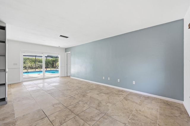 9696 Honeysuckle Avenue, Palm Beach Gardens, FL 33410