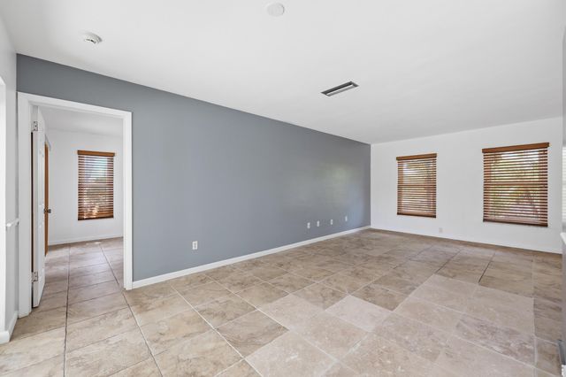 9696 Honeysuckle Avenue, Palm Beach Gardens, FL 33410