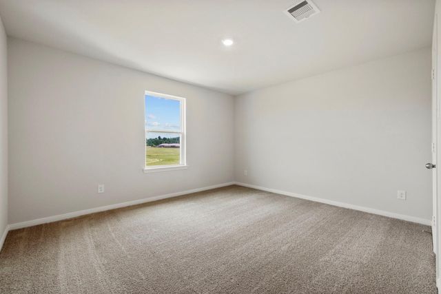 25515 Blooming Hazel Drive, Cleveland, TX 77328