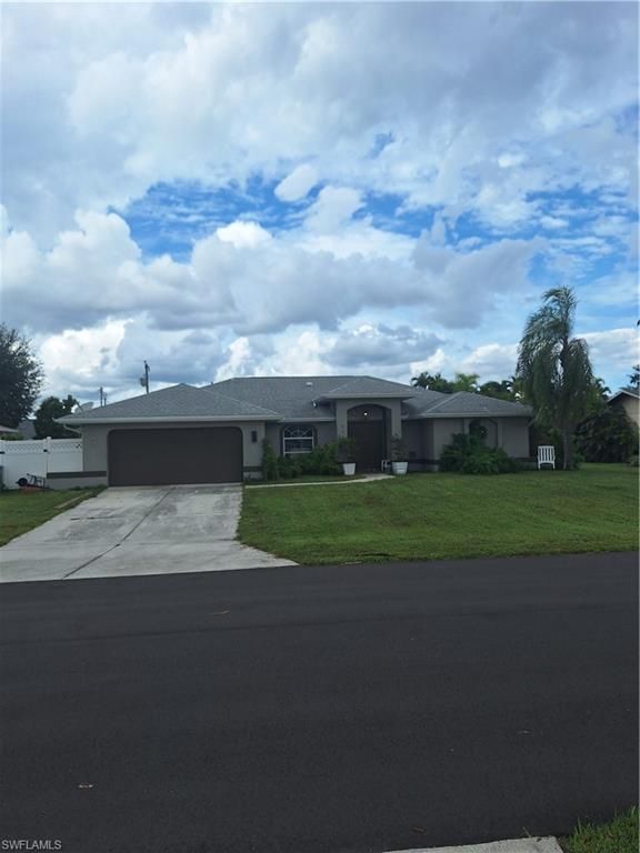 Image 1 of property listing at 411 SE 30th ST, Cape Coral, FL 33990