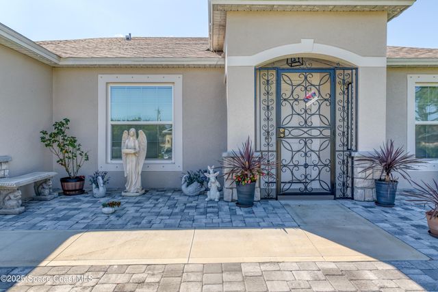516 Olsmar Street SW, Palm Bay, FL 32908