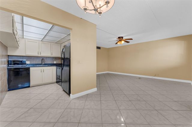 300 Village Green Circle 210, Palm Springs, FL 33461