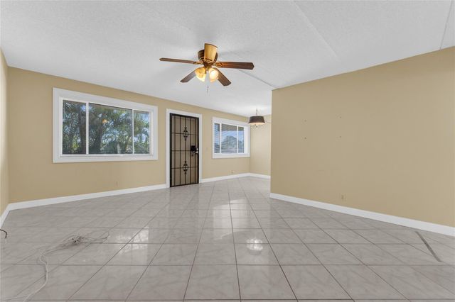 300 Village Green Circle 210, Palm Springs, FL 33461