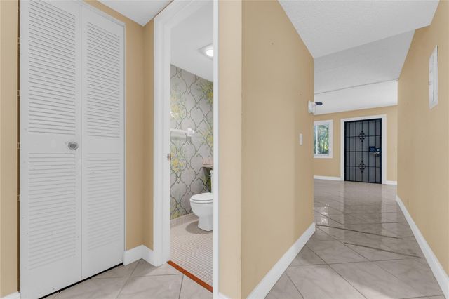 300 Village Green Circle 210, Palm Springs, FL 33461