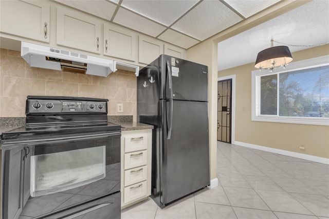 300 Village Green Circle 210, Palm Springs, FL 33461