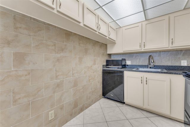 300 Village Green Circle 210, Palm Springs, FL 33461