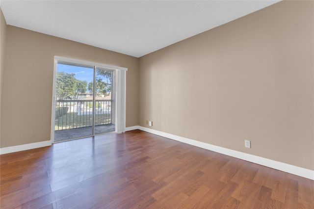300 Village Green Circle 210, Palm Springs, FL 33461
