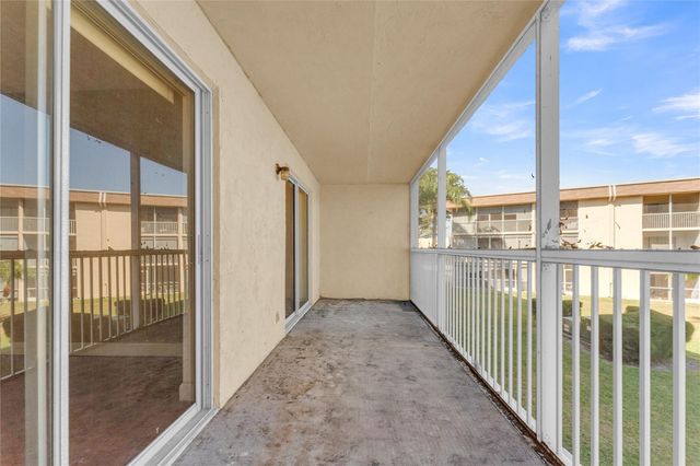 300 Village Green Circle 210, Palm Springs, FL 33461