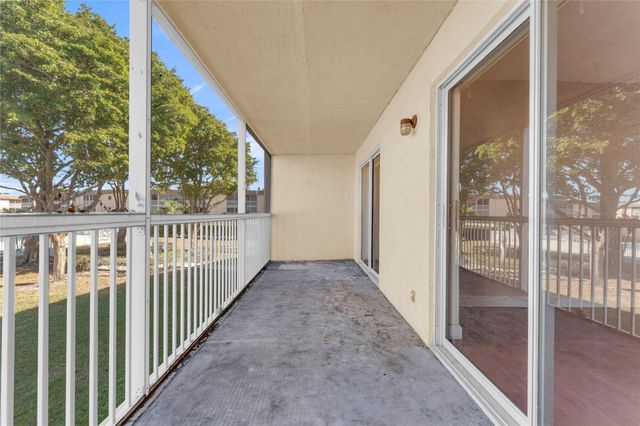 300 Village Green Circle 210, Palm Springs, FL 33461