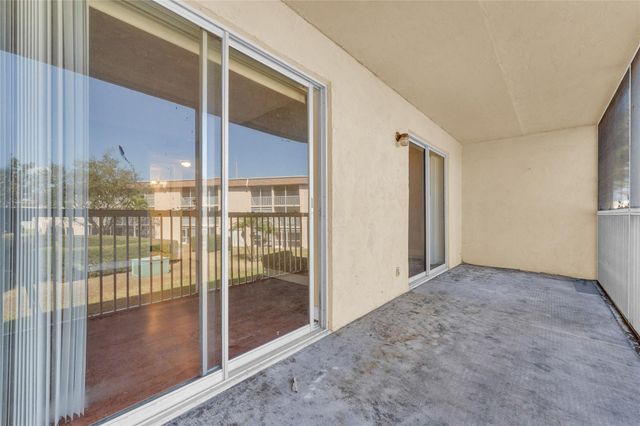 300 Village Green Circle 210, Palm Springs, FL 33461