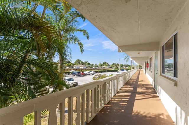 300 Village Green Circle 210, Palm Springs, FL 33461